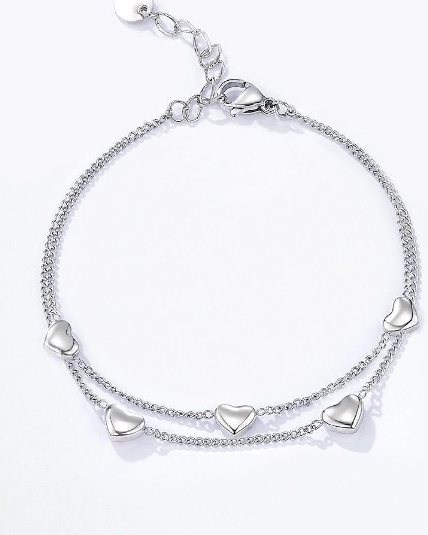 Bracciale con doppia catena di cuori