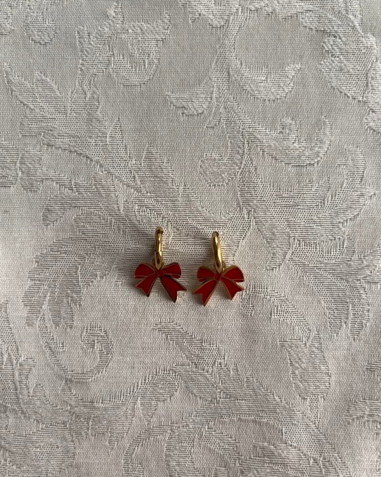 Orecchini fiocco rosso